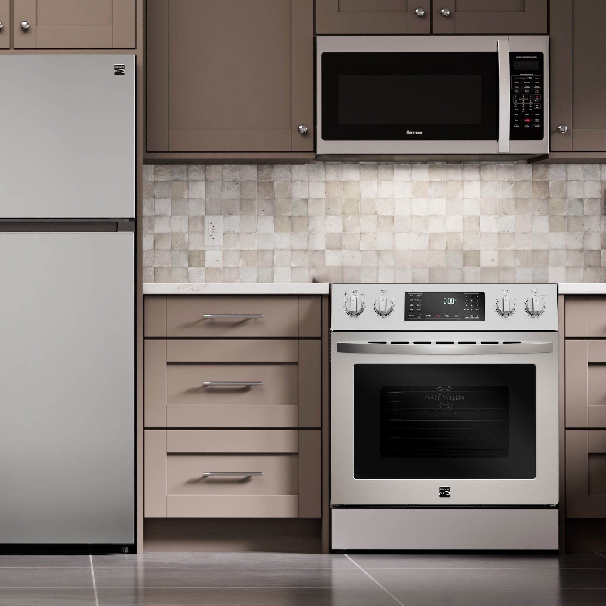 Kenmore stainless steel electric range installed in a light gray and beige kitchen
