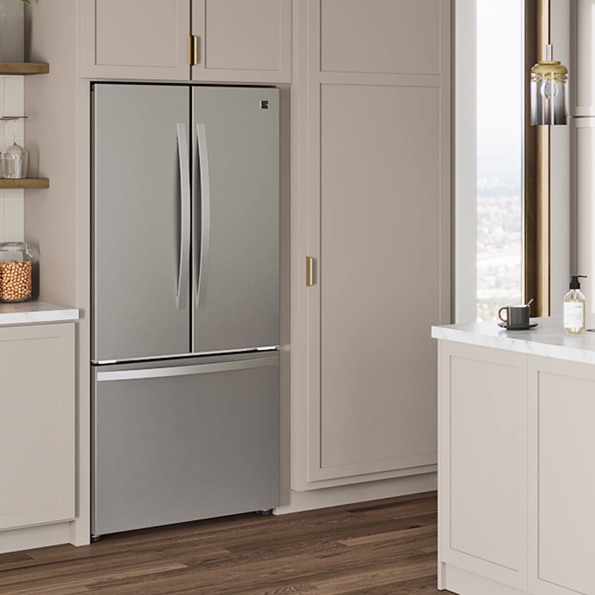 Kenmore 17.5 cu. ft. counter depth french door refrigerator in stainless steel installed in a light gray and beige kitchen