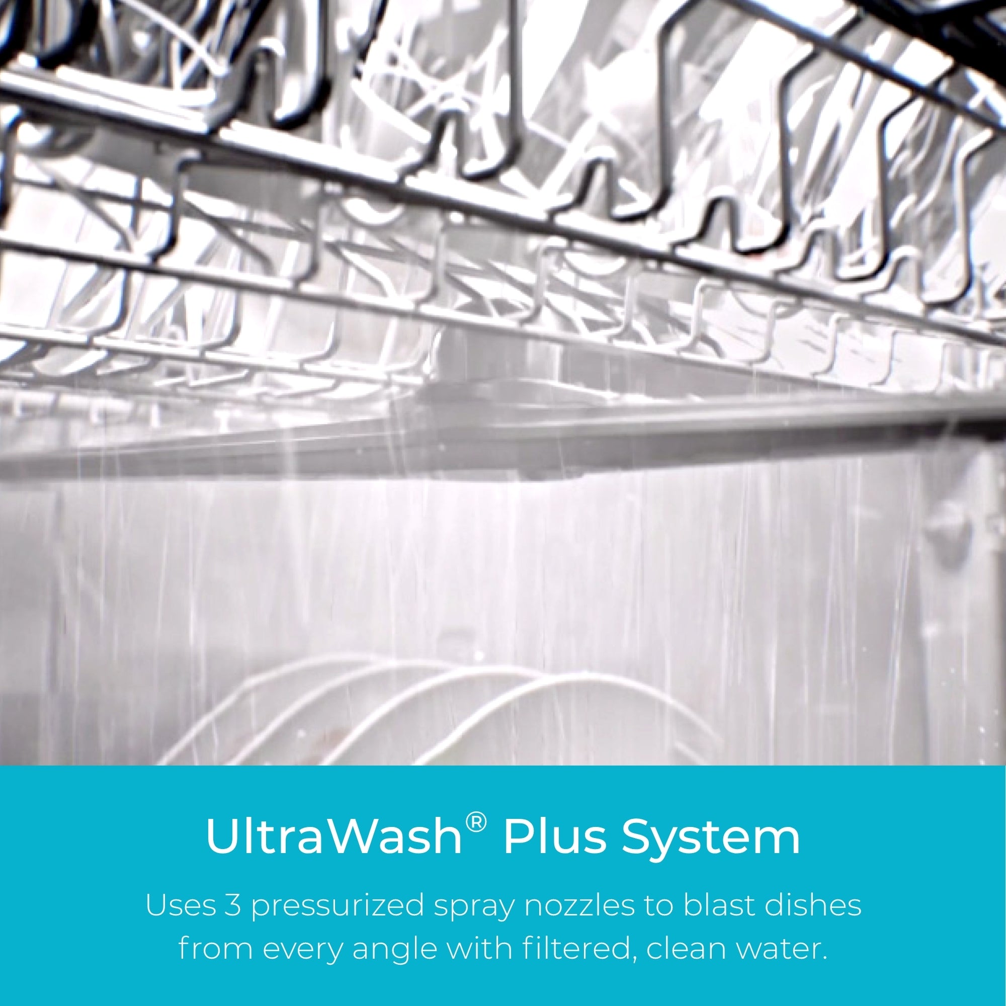 Closeup of the interior of the Kenmore stainless steel dishwasher with water spraying. Text below reads, "UltraWash Plus System: Uses 3 pressurized spray nozzles to blast dishes from every angle with filtered, clean water."