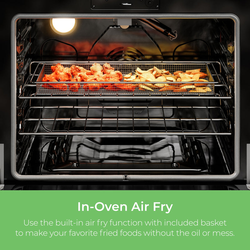 Closeup of the interior of the Kenmore stainless steel gas range with chicken wings and potato wedges in the airfryer basket inside. Text below reads, "In-Oven Air Fry: Use the built-in air fry function with included basket to make your favorite fried foods without the oil or mess."
