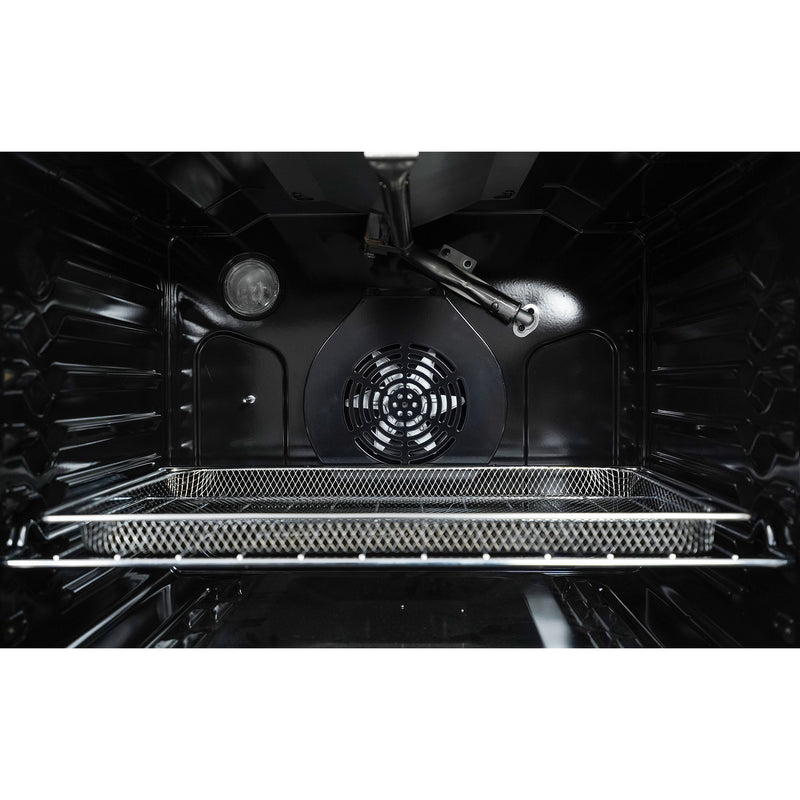 Closeup of the interior of the Kenmore stainless steel gas range with the empty airfryer basket inside