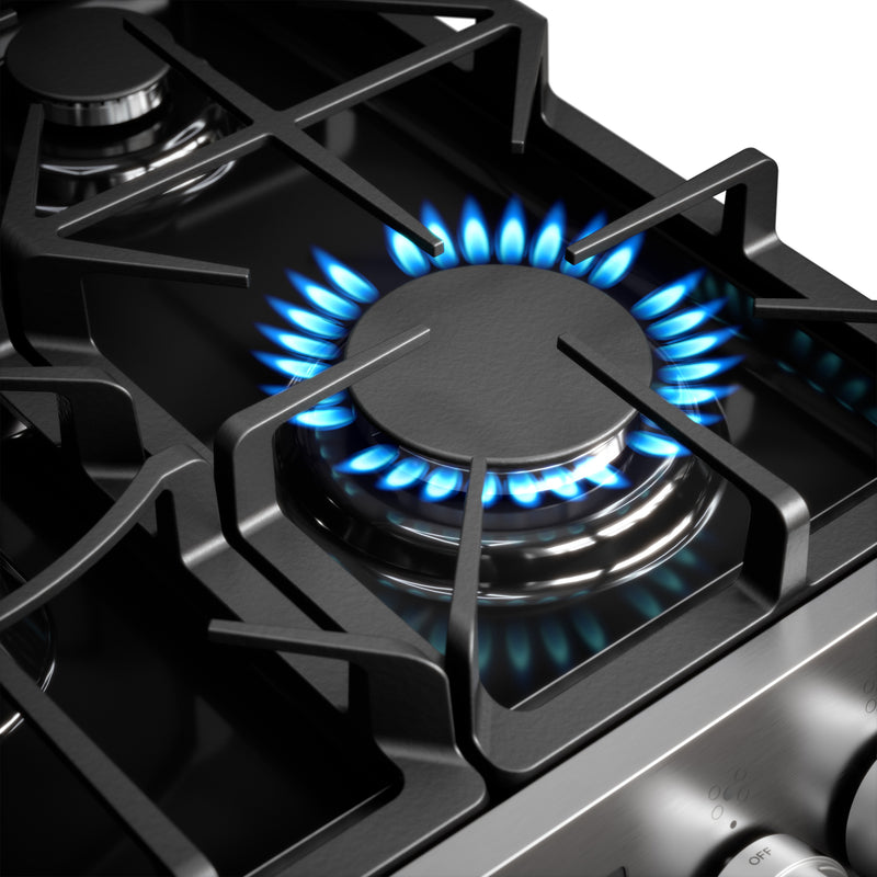 Closeup of the gas flame on a burner on the Kenmore stainless steel gas range