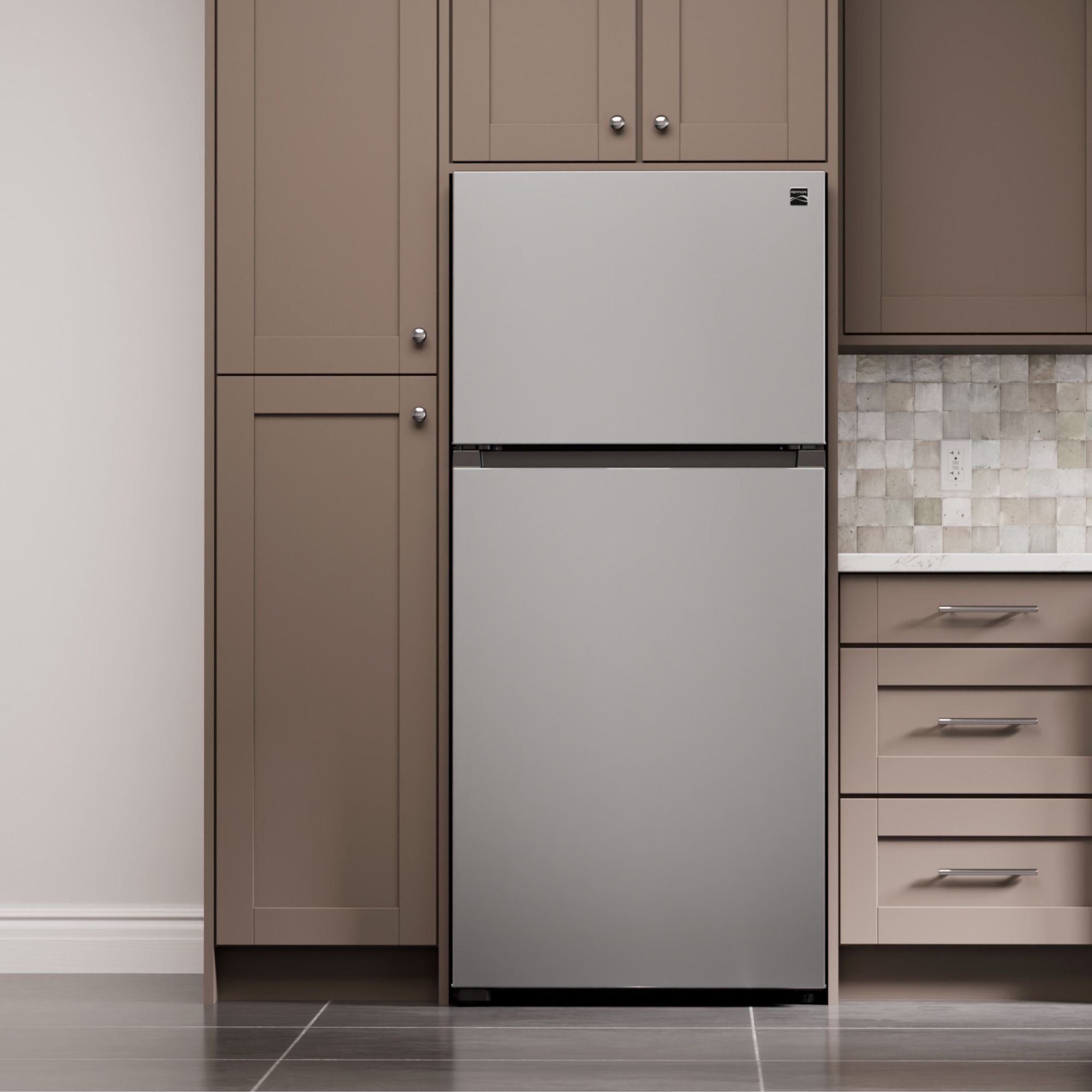 Kenmore stainless steel top mount refrigerator in a light gray and beige kitchen