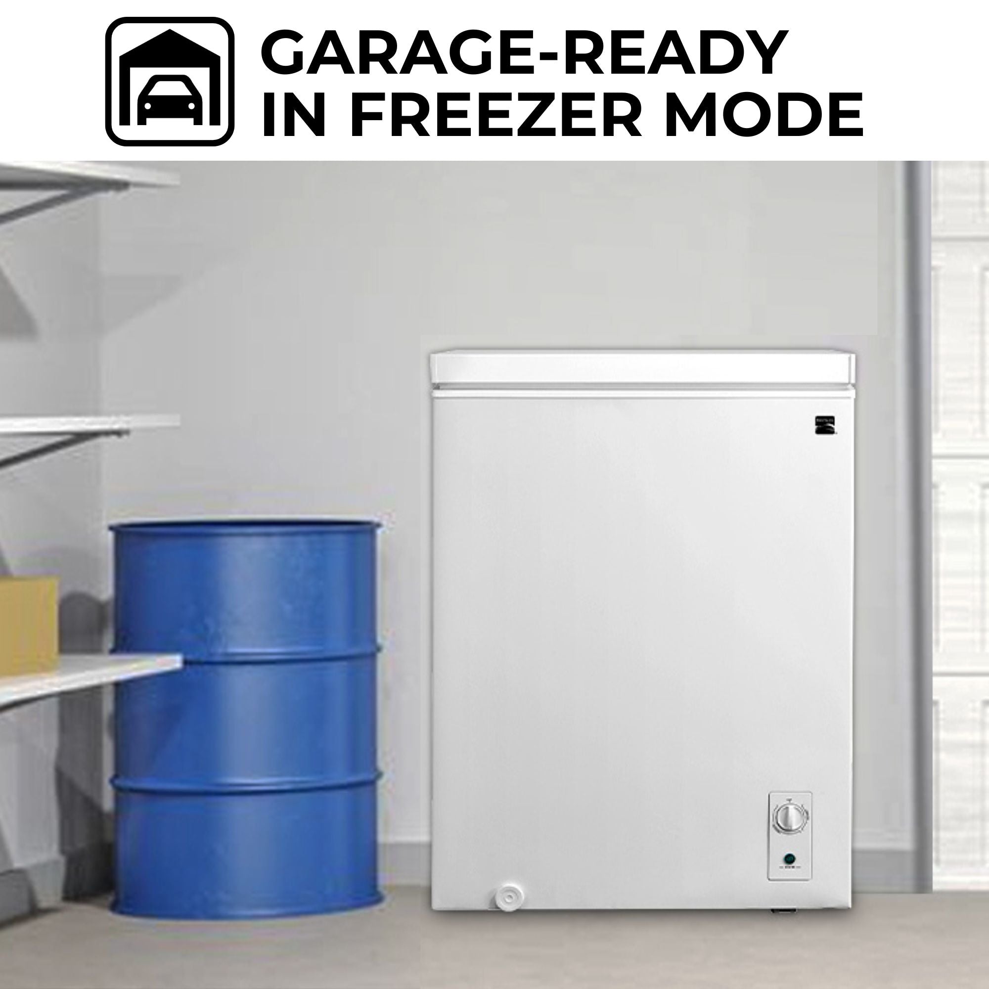 Kenmore convertible upright freezer/refrigerator, closed, in a garage with a light gray wall behind, blue metal barrel and shelves to the left, and white garage door to the right. Text above reads, "Garage-ready in freezer mode"