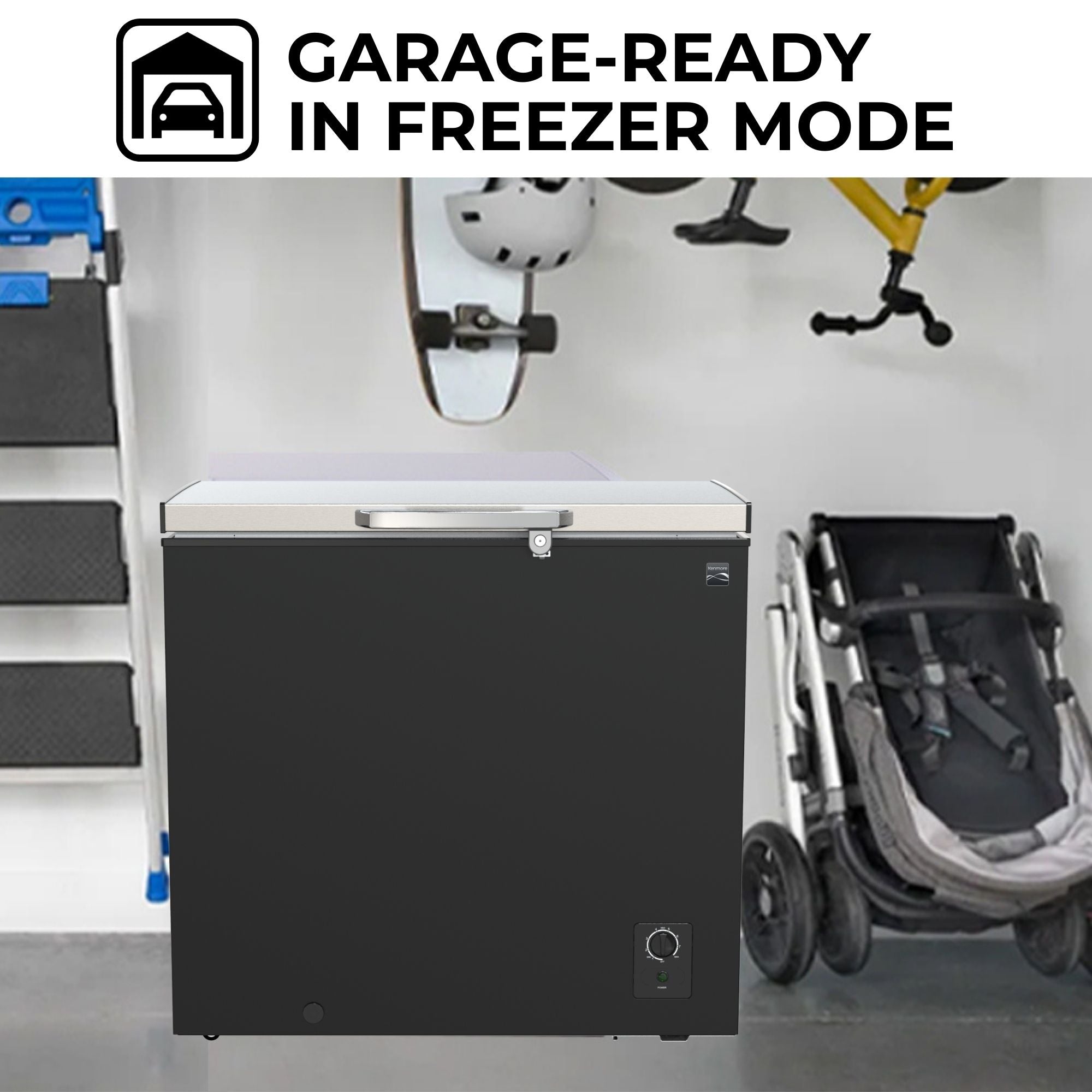 Kenmore chest freezer, closed, in a garage with a white behind and a ladder, stroller, skateboard, and bicycle arranged around it. Text above reads, "Garage-ready in freezer mode"
