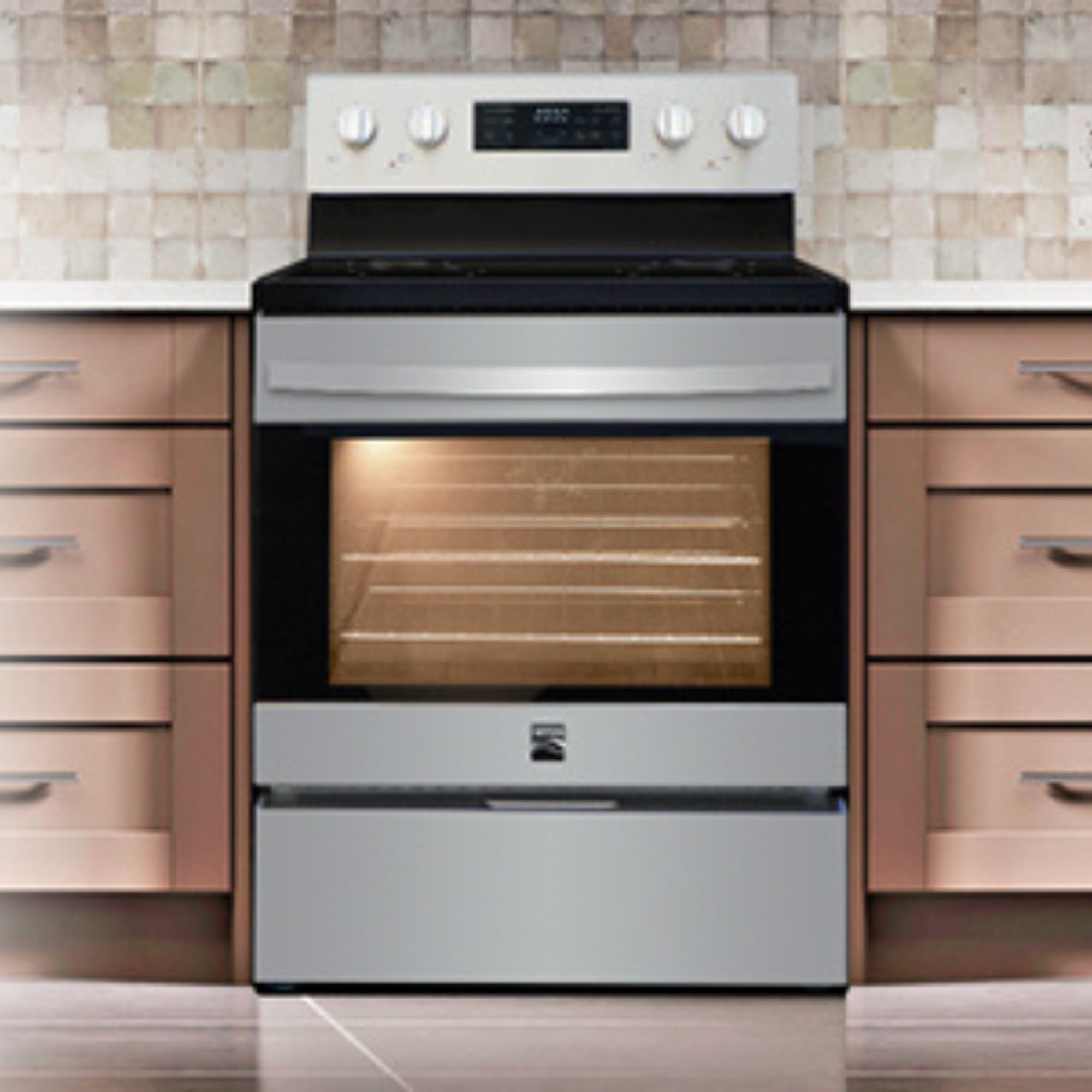 Kenmore 5.0 cubic foot rear-control smooth-top range installed between beige drawers