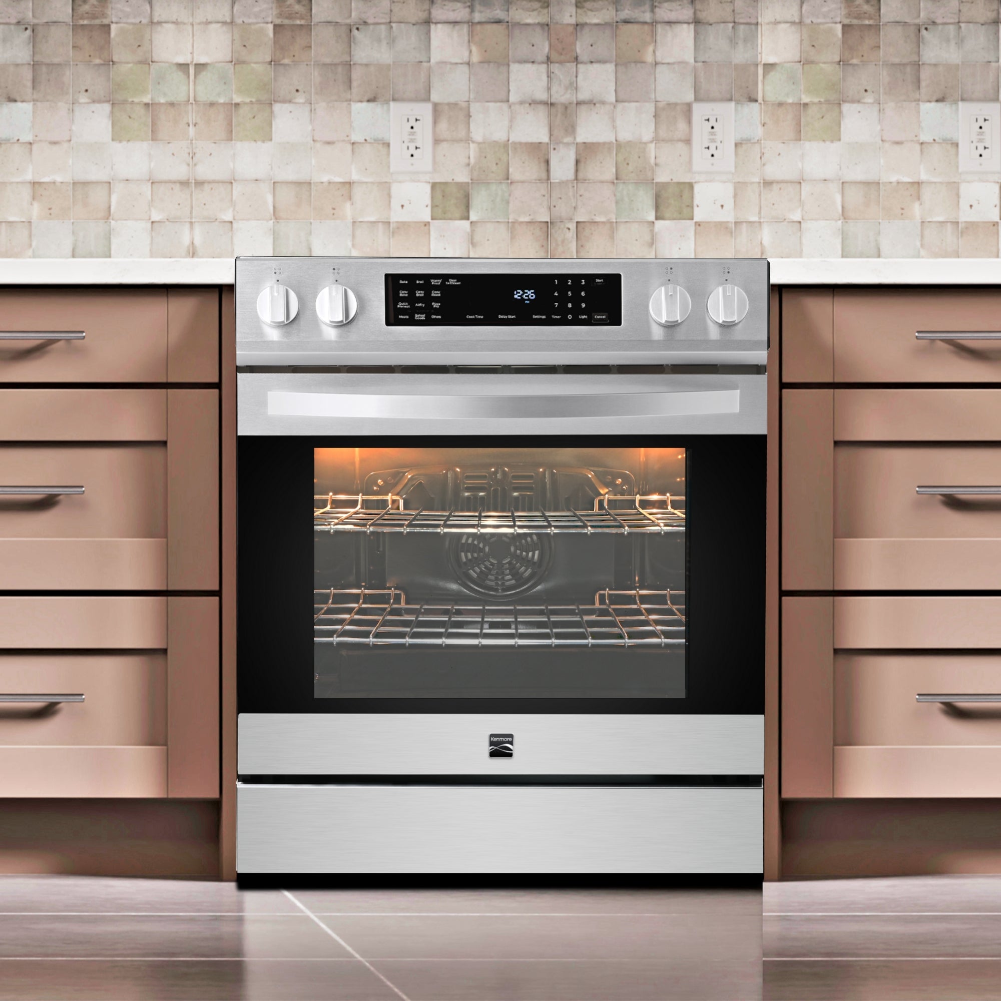 Kenmore Pizza Pro 5.6 cu ft induction range, closed, in a beige kitchen.