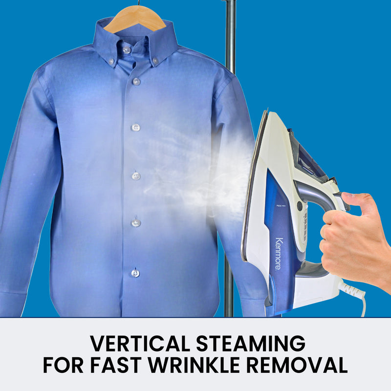 A person's hand holding the Kenmore power steam iron vertically to steam a blue dress shirt on a wooden hanger. Text below reads, "VERTICAL STEAMING FOR FAST WRINKLE REMOVAL"
