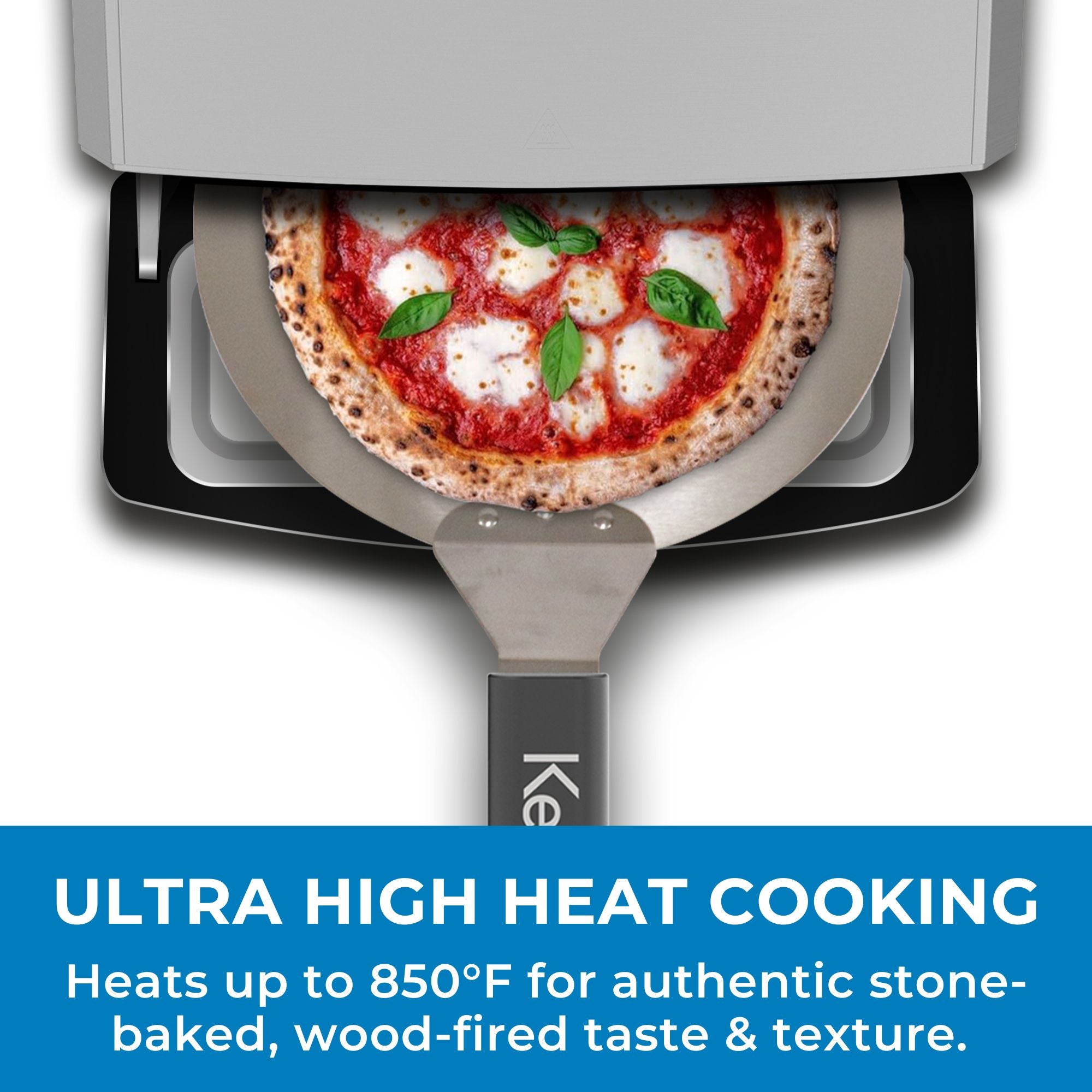 Top view of Kenmore indoor & outdoor countertop pizza oven with door open and pizza peel with a cooked pizza halfway out. Text below reads, "Ultra high heat cooking: Heats up to 850°F for authentic stone-baked, wood-fired taste and texture"