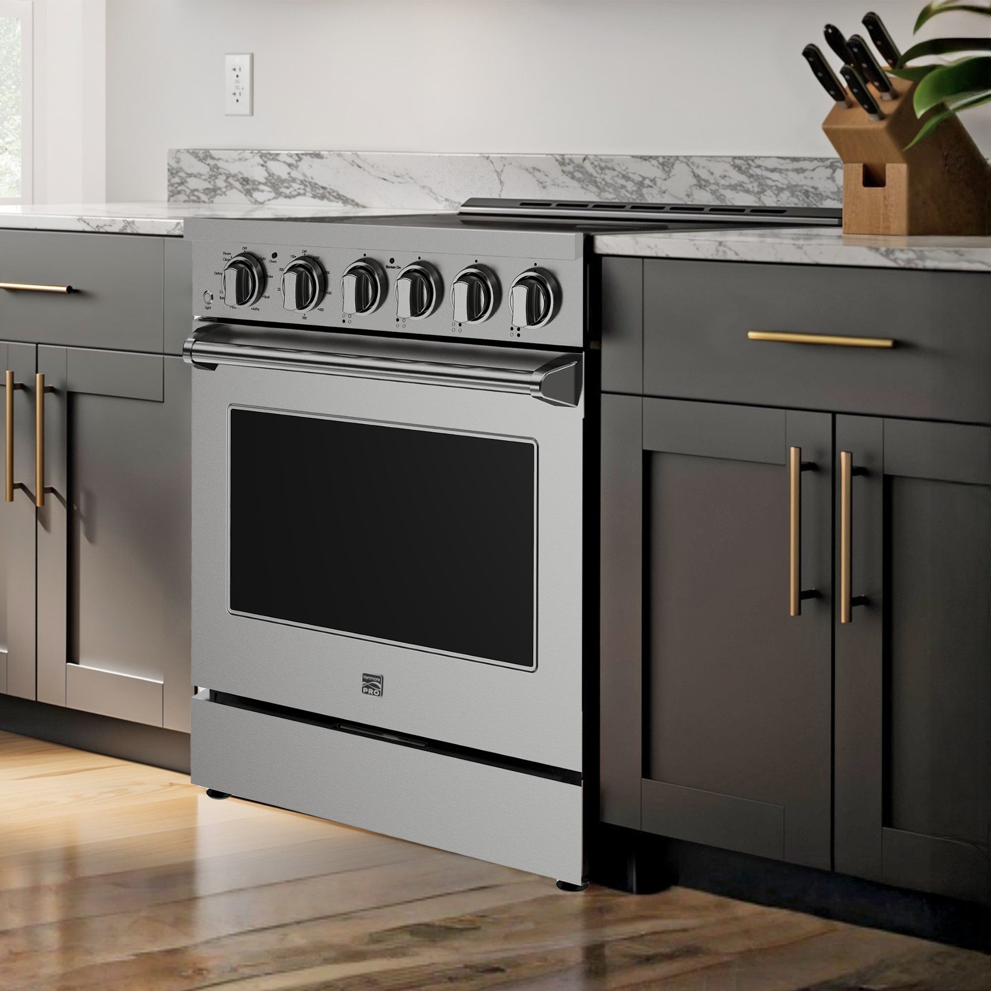 Kenmore PRO stainless steel front-control range installed in a bright, modern residential kitchen