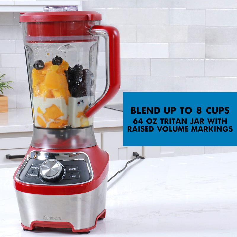 Blender filled with peaches, milk, blackberries and blueberries on a white marble kitchen counter with a white tile backsplash behind it. Text overlay reads, Blend up to 8 cups: 64 oz Tritan jar with raised volume markings.