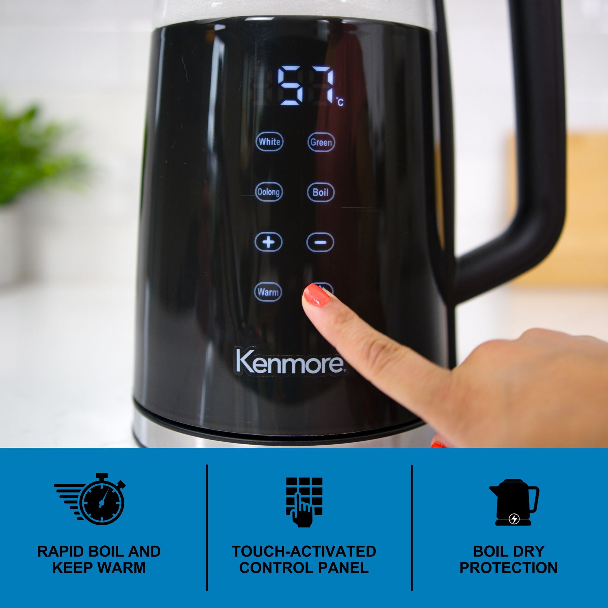 Closeup picture of a person's finger touching the digital controls on the side of the Kenmore cool-touch glass kettle. Text and icons below describe features: Rapid boil and keep warm; touch-activated control panel; boil dry protection
