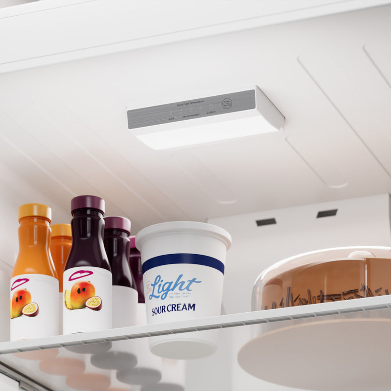 Closeup of inside the Kenmore metallic steel top mount refrigerator showing the LED interior light