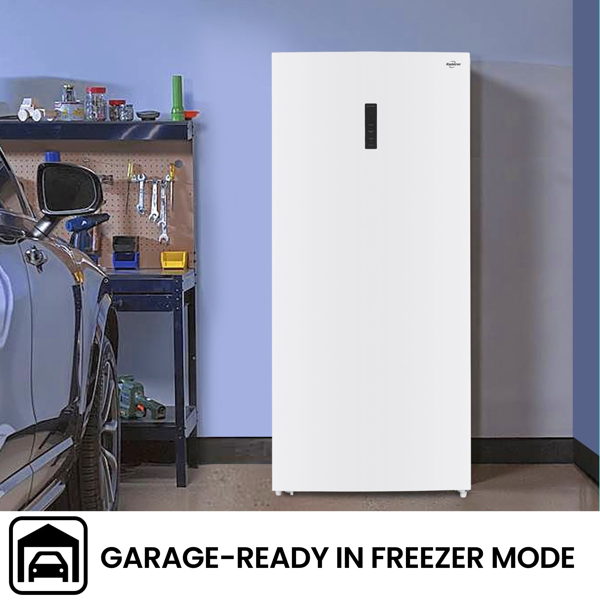 Koolatron convertible upright freezer/refrigerator, closed, in a garage with a tool bench and car partly visible beside it. Text above reads, "Garage-ready in freezer mode"