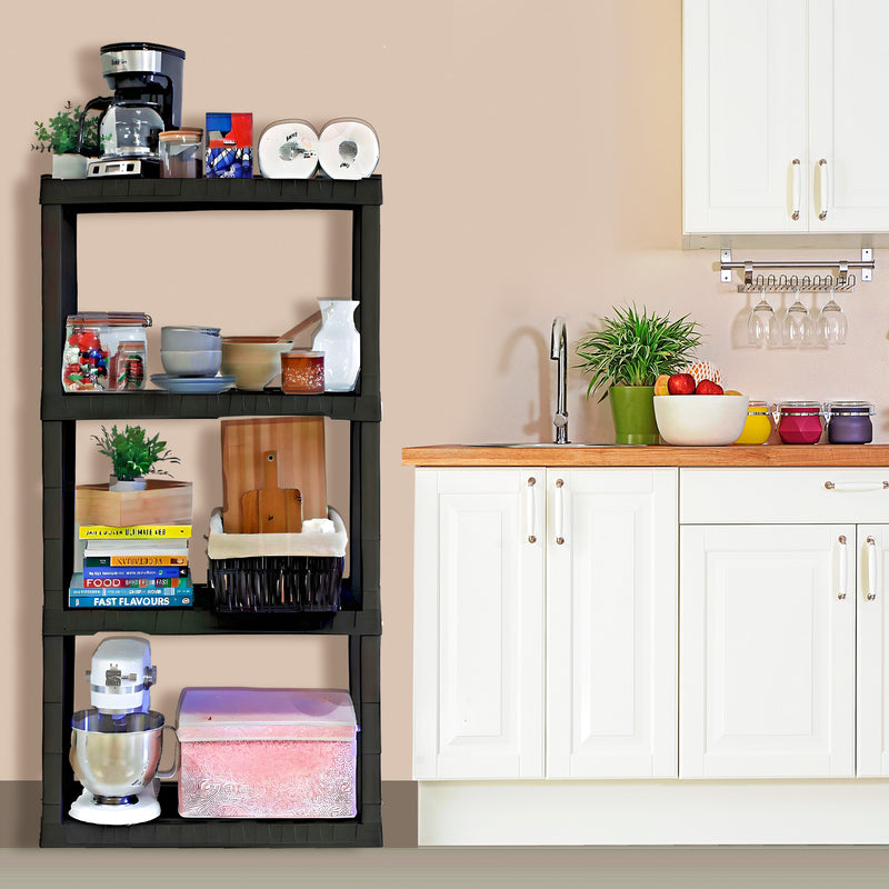 Oskar 4-tier shelf unit loaded with kitchen and pantry items set up beside a white kitchen counter and sink