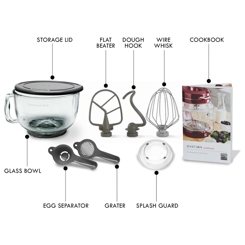 Product shot on white background of accessories, labeled from top left: Storage lid; flat beater; dough hook; wire whisk; cookbook; glass bowl; egg separator; grater; splash guard
