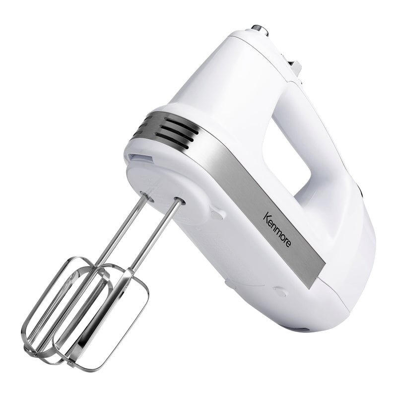 Product shot of hand mixer on white background with beaters attached