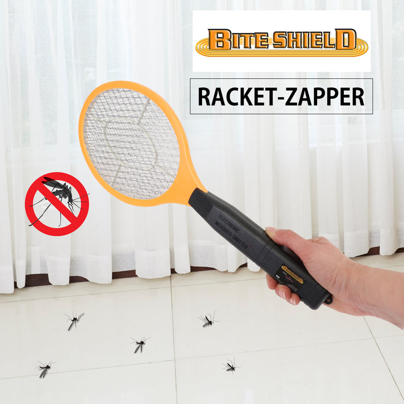 Lifestyle image of a hand holding the Bite Shield racket zapper electronic insect killer with a white curtain in the background and dead mosquitoes on a white floor beneath and a diagram of a mosquito in a crossed out red circle to the left. Text above reads, "Bite Shield Racket Zapper"