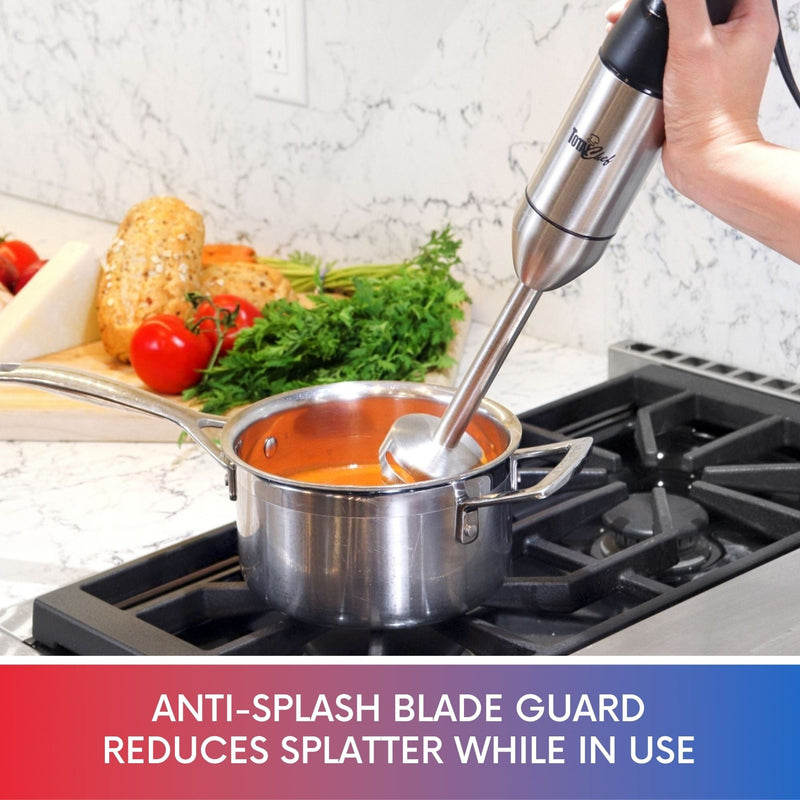 Lifestyle image of hand holding blender in a pot of tomato soup on a black gas range. Text below reads "Anti-splash blade guard reduces splatter while in use"